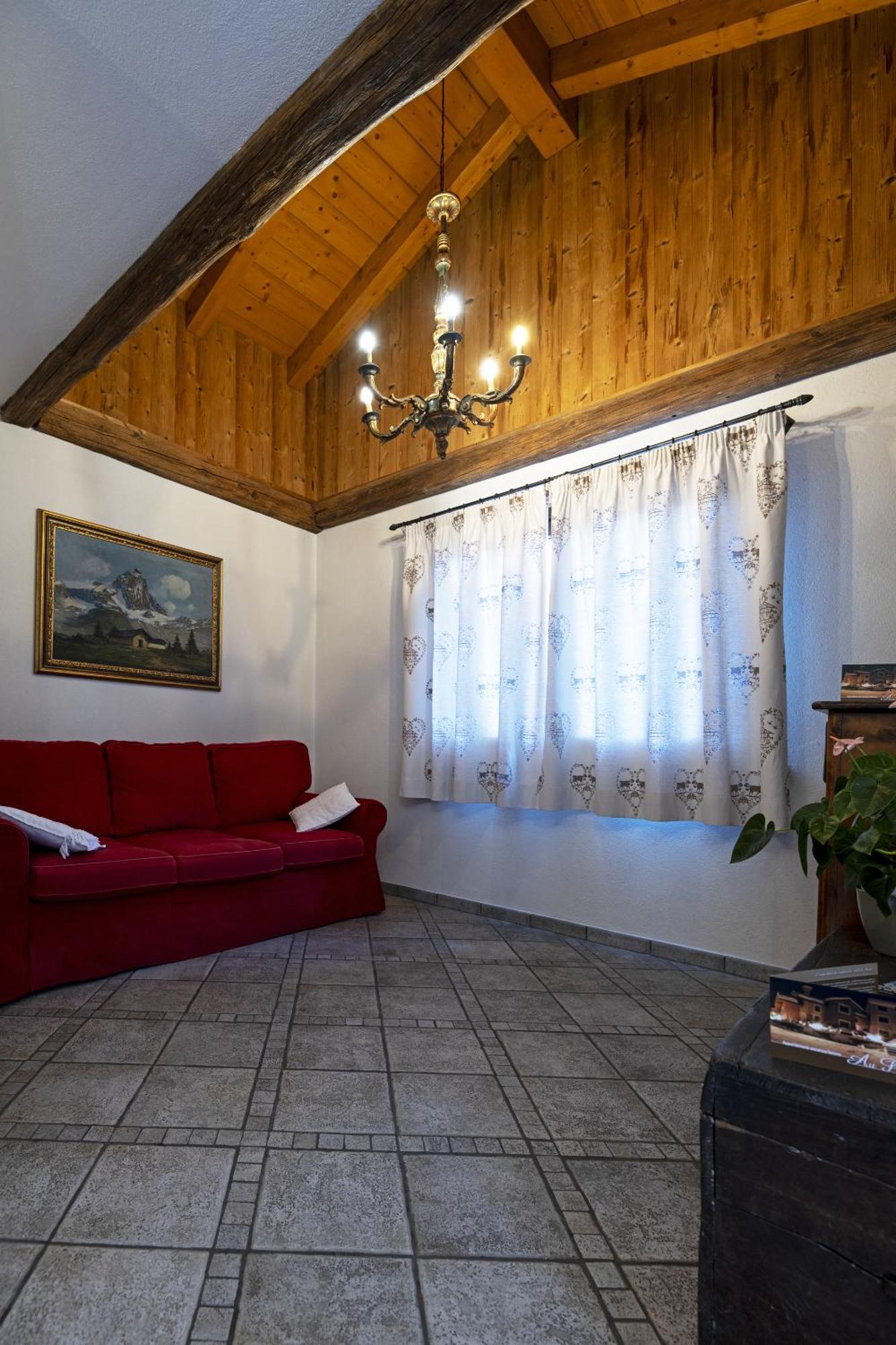 Au Petit Chevrot Aparthotel Aosta Exterior photo